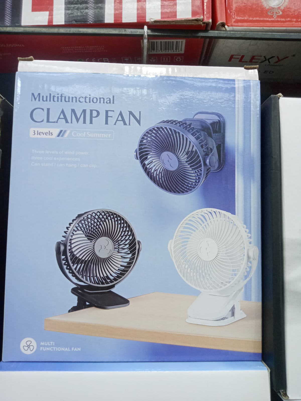 Compact vertical clip fan with adjustable head and strong grip for desk and outdoor cooling